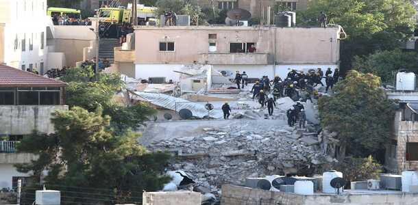 مصرع شخص وإصابة 14 آخرين بانهيار مبنى في العاصمة الاردنية